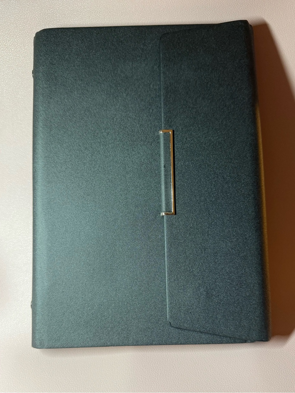 Classic black faux leather 6-ring planner with elegant gold-tone hardware